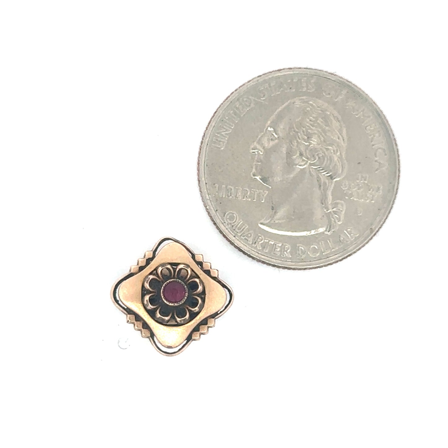 Antique Victorian ruby slider pendant in 10K rose gold with intricate detailing, featuring a vibrant ruby gemstone.
