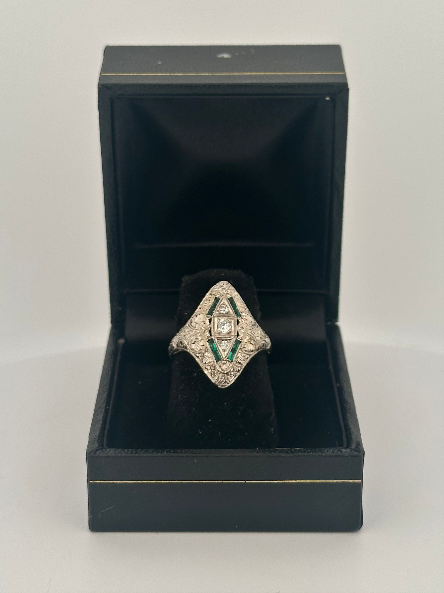 Antique 18k white gold natural diamond and emerald shield ring