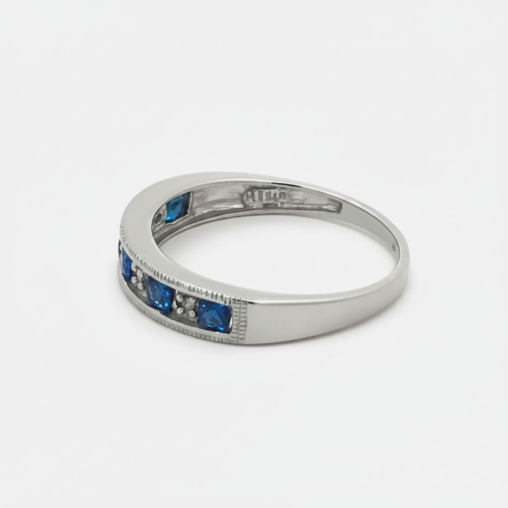Vintage sapphire and diamond band in 14k white gold with intricate detailing, crafted by Silver Lady Vintage.