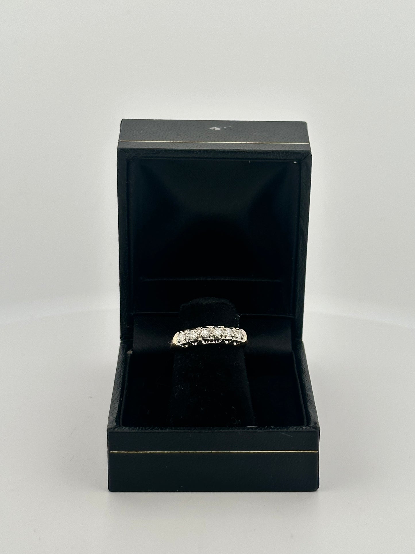 Vintage natural diamond half eternity band circa 1950s in 14k gold