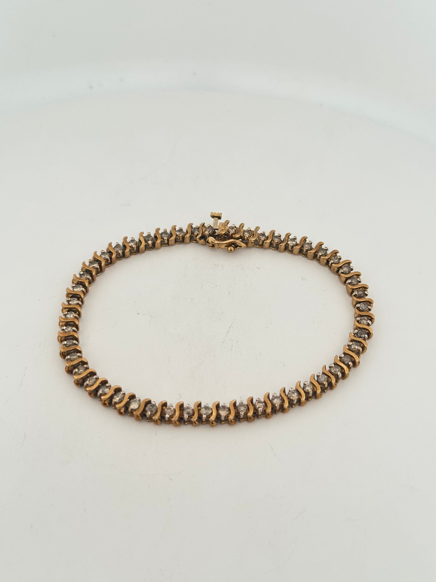 Vintage natural 2.5ct diamond tennis bracelet in 10k gold