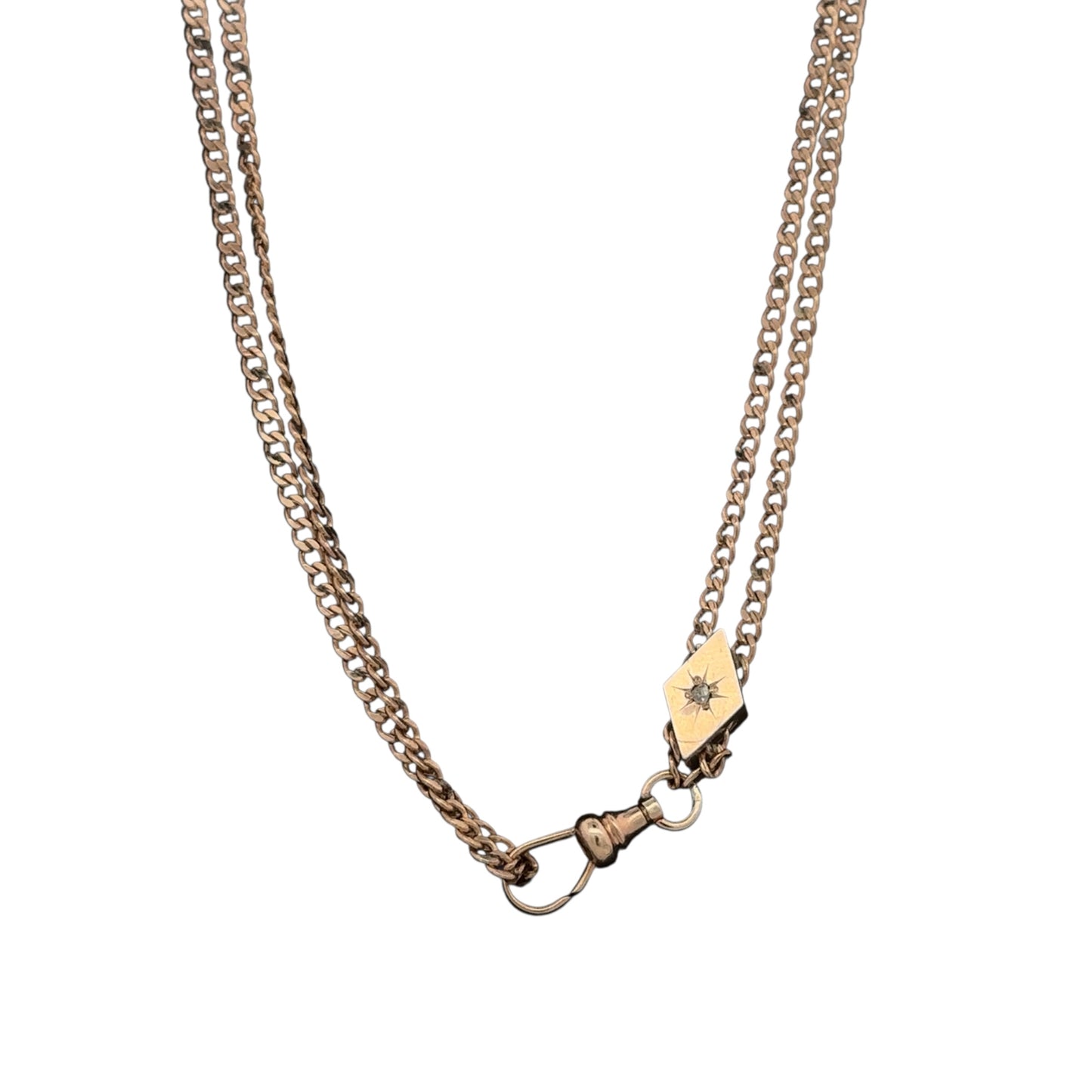 Antique Victorian watch chain with rose cut diamond slider in 10k gold, vintage Silver Lady piece with intricate design and craftsmanship.