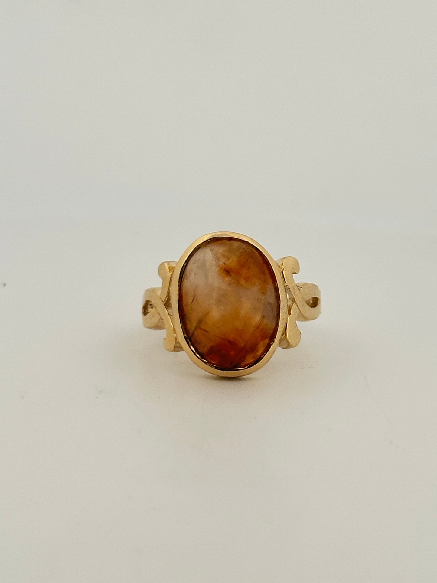 Fire agate cabochon ring in 10k yellow gold