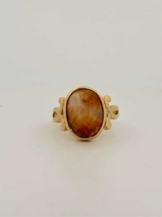 Fire agate cabochon ring in 10k yellow gold