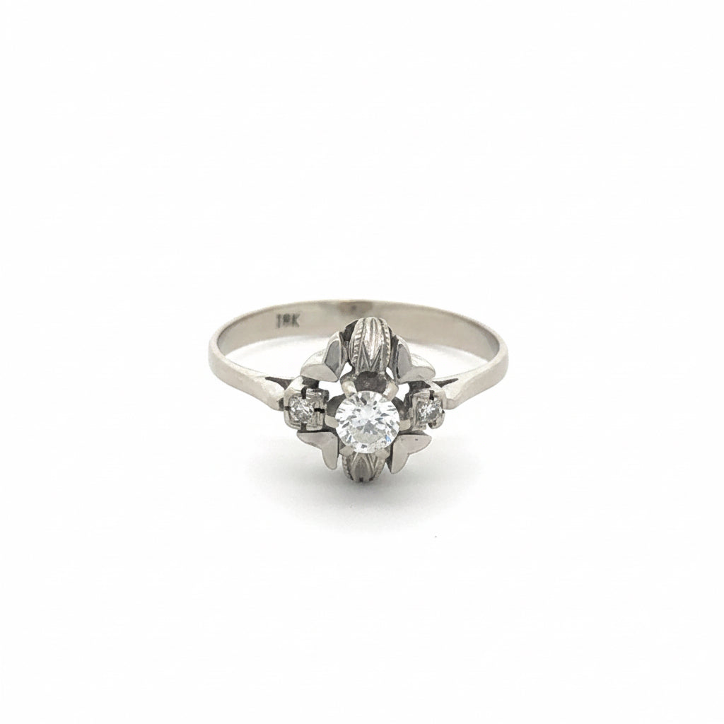 Art Deco floral motif diamond ring in 18k white gold, silver lady vintage jewelry featuring intricate floral designs and sparkling diamonds.