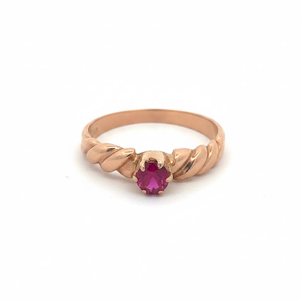 Victorian Ruby Solitaire Ring in 14K Rose Gold featuring a central ruby gemstone and intricate vintage design.