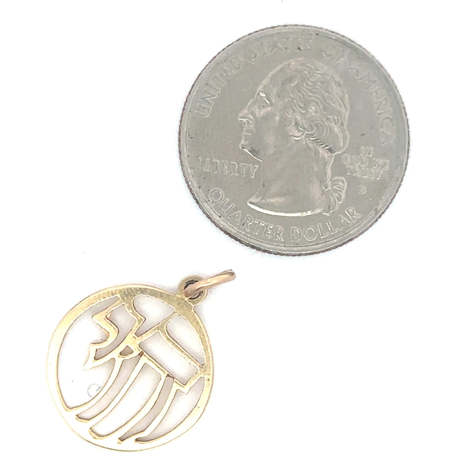 Openwork Judaica Chai pendant charm in 14k yellow gold, featuring intricate design, from Silver Lady Vintage.