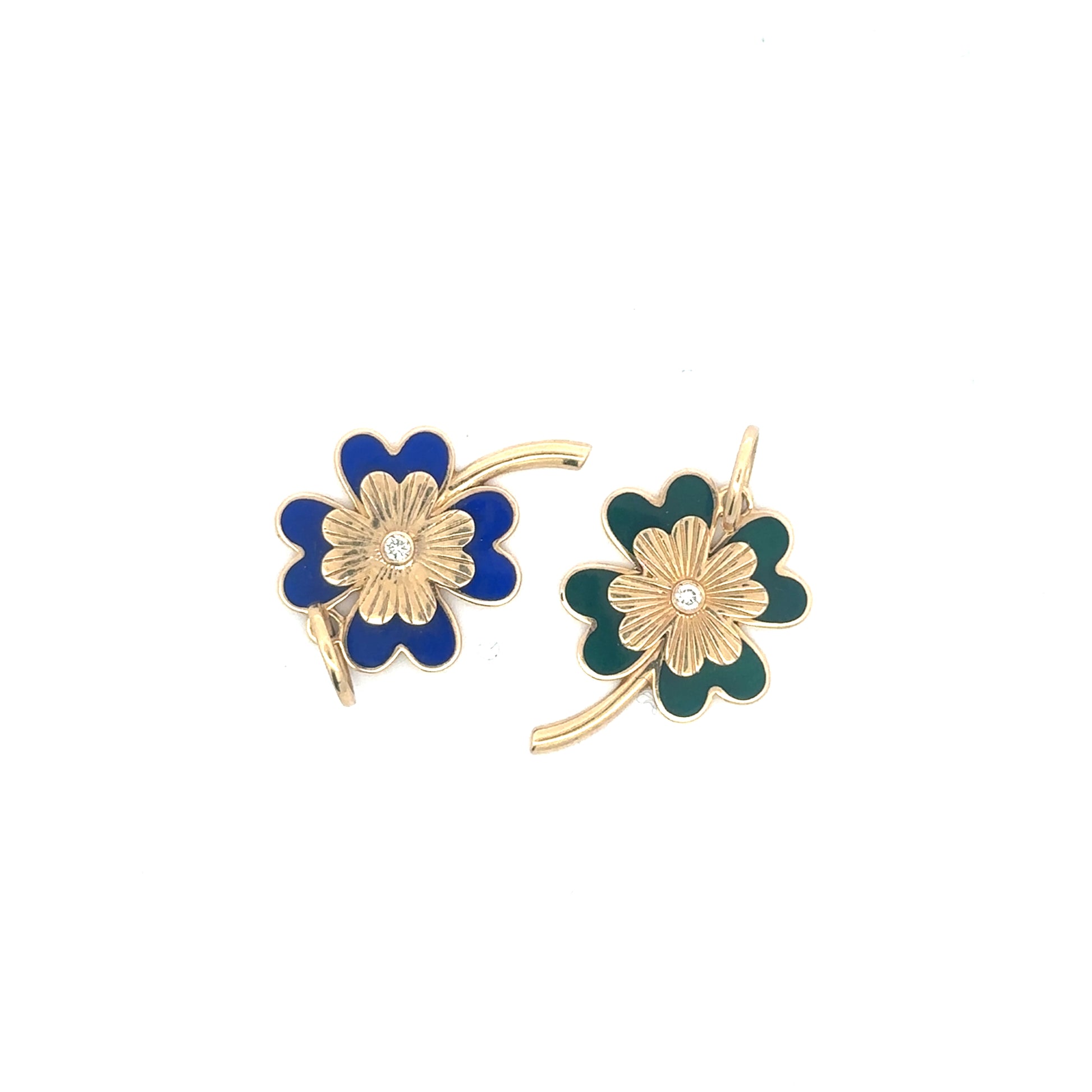 Silver Lady Vintage enamel and yellow gold clover pendant with diamond center, showcasing intricate design and sparkling gemstone details.