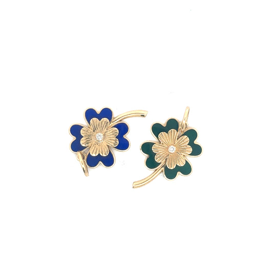 Silver Lady Vintage enamel and yellow gold clover pendant with diamond center, showcasing intricate design and sparkling gemstone details.