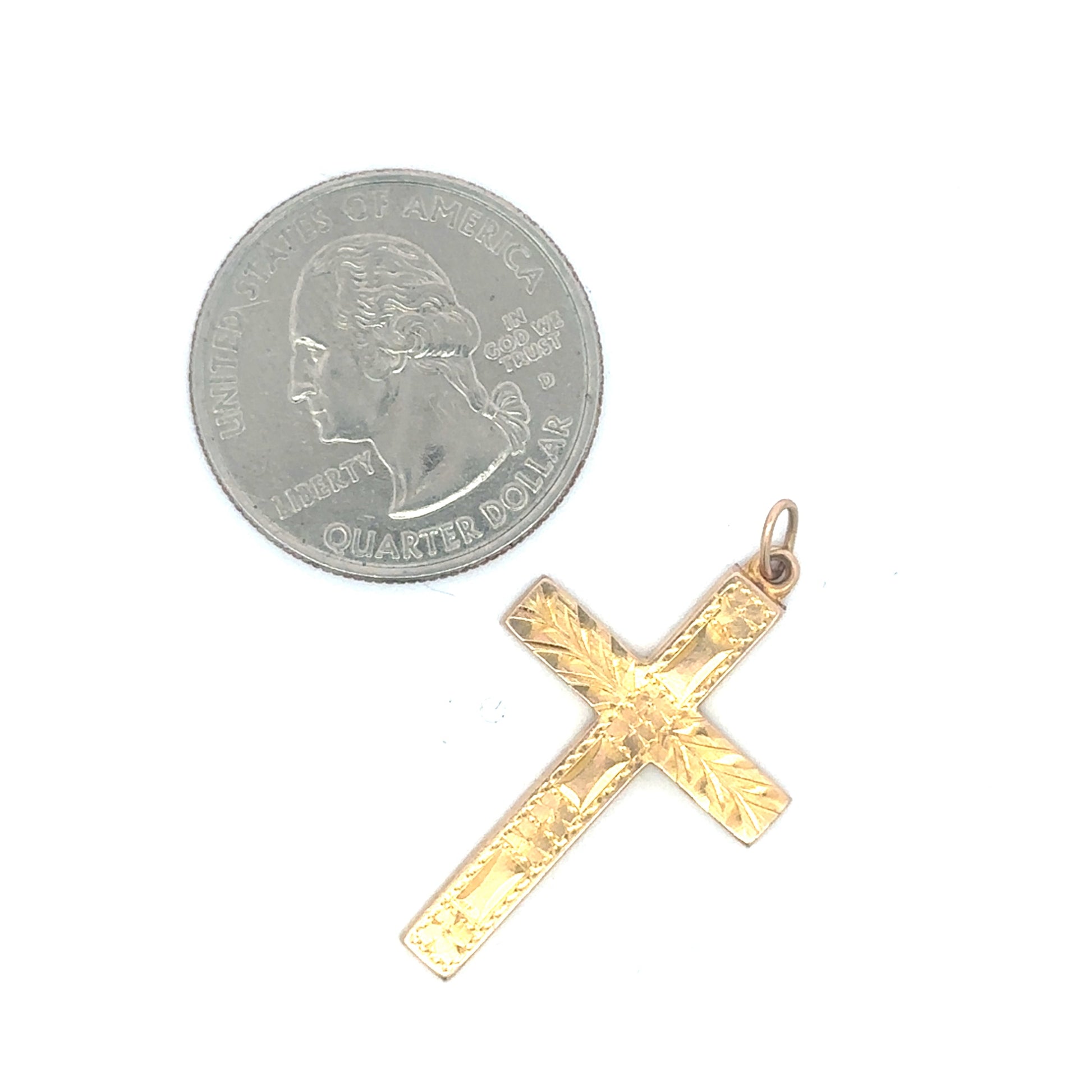 Antique Victorian engraved cross pendant in 10K yellow gold with intricate detailing, from Silver Lady Vintage.
