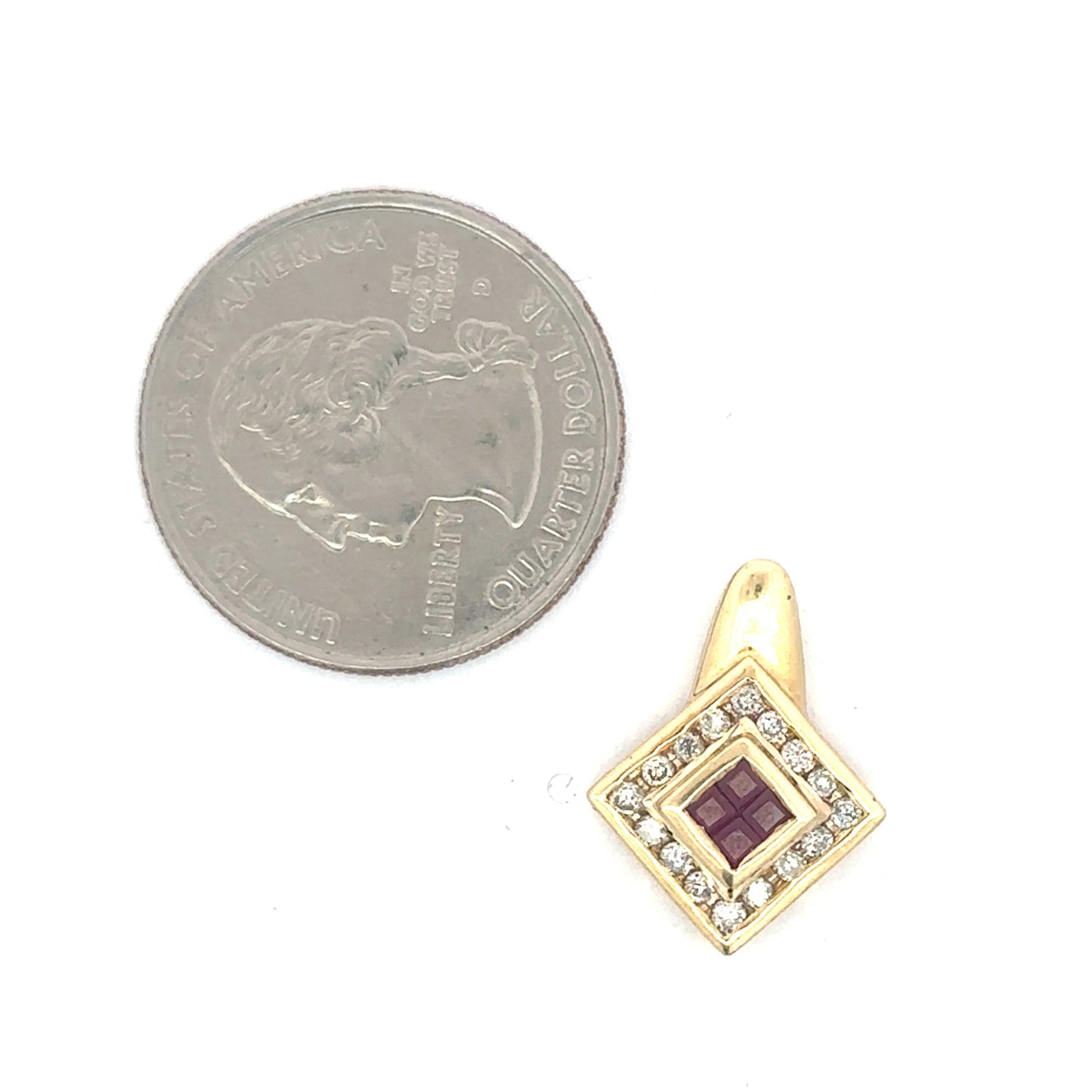 Vintage Ruby Cluster Pendant with Diamond Halo in 14k yellow gold, featuring a central ruby surrounded by sparkling diamonds.