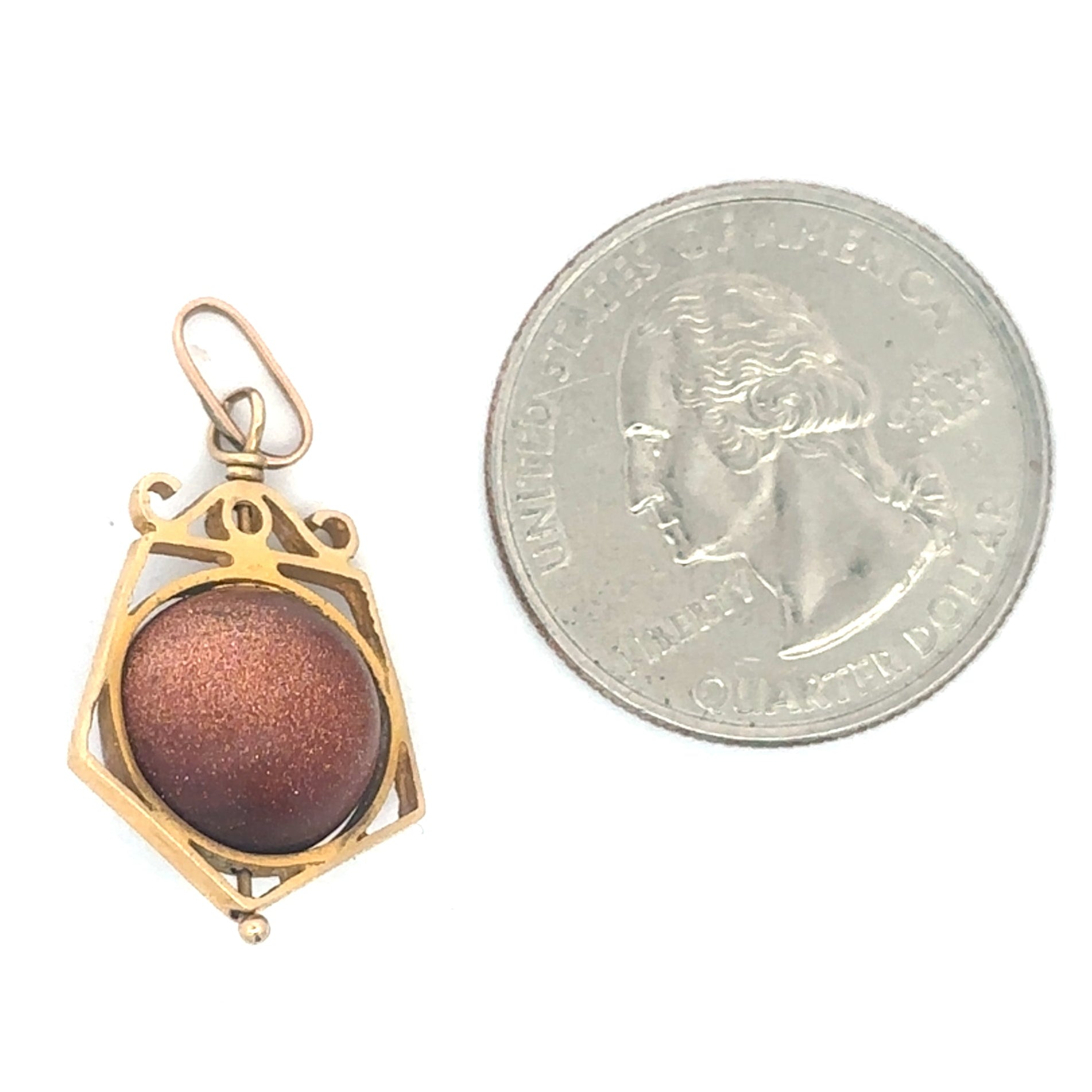 Antique Victorian gold stone fob spinner pendant charm in 14k yellow gold with intricate vintage design