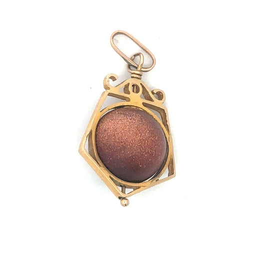 Victorian gold stone fob spinner pendant charm in 14k yellow gold with intricate vintage design and Silver Lady Vintage branding