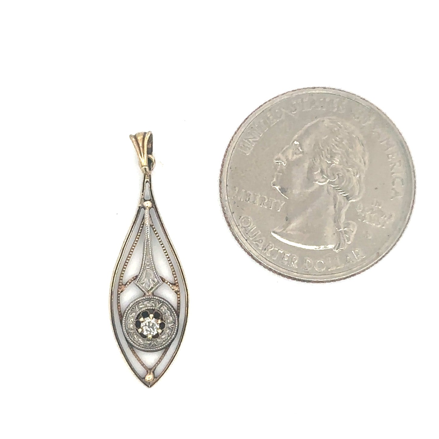 Antique Victorian diamond lavalier pendant in 14k white and yellow gold with intricate detailing and a delicate chain.
