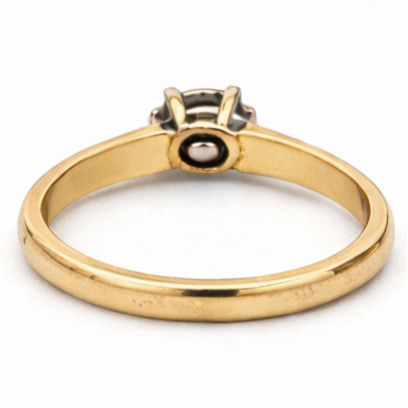 Vintage natural diamond solitaire in 9k gold