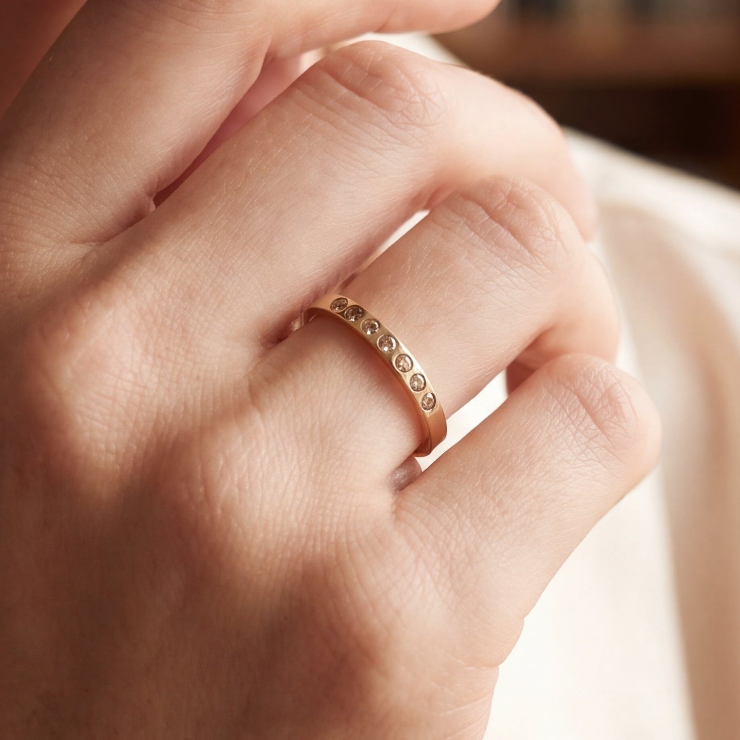 Silver Lady Vintage Flush-Set Champagne Diamond Band showcasing a delicate silver ring with champagne diamonds in a flush setting.