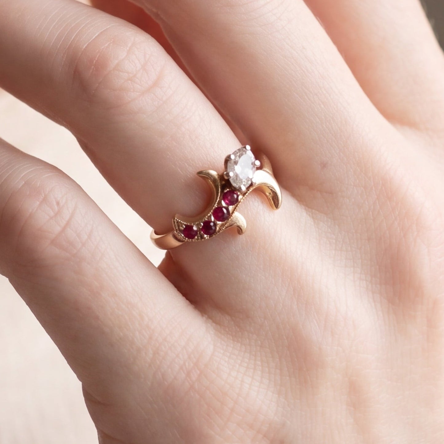 Antique Victorian Moval diamond and ruby ring in 14k yellow gold, featuring intricate vintage design and gemstone accents