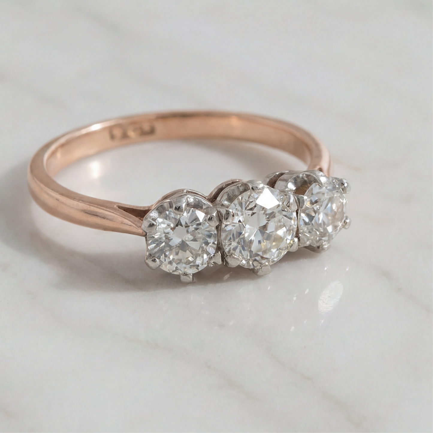 Antique natural old mine cut diamond three stone ring set in 9k gold