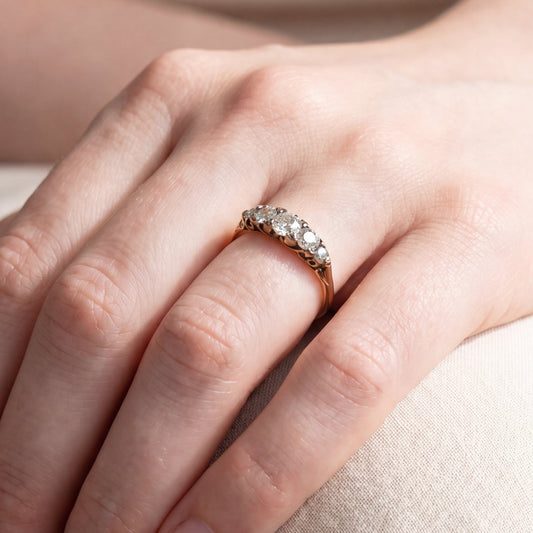 Antique Victorian mine cut diamond band in 18k yellow gold, featuring vintage craftsmanship and intricate detailing.