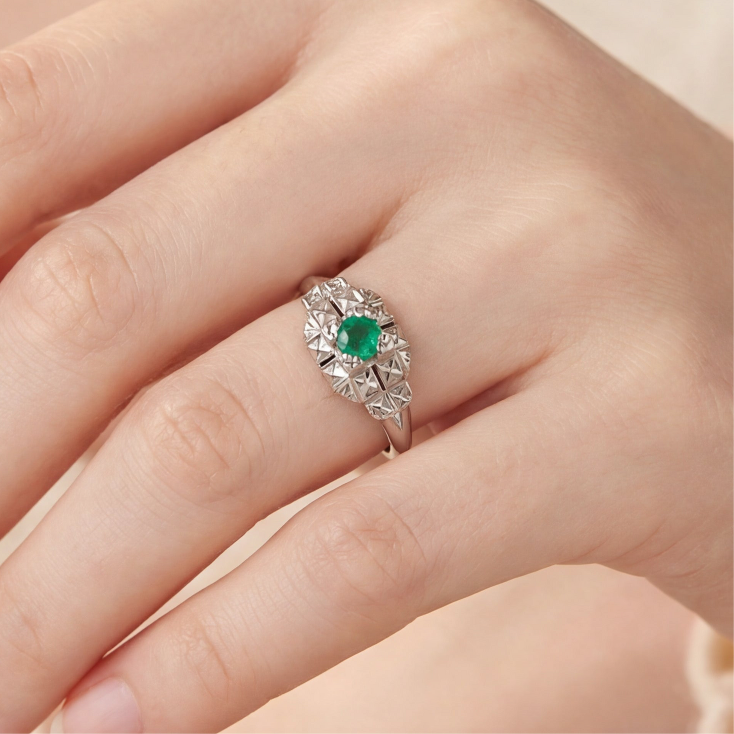 Art deco emerald ring in 14k white gold
