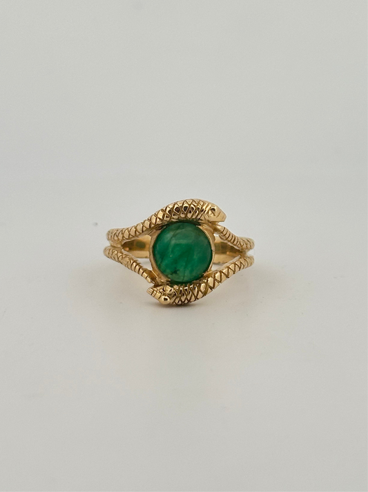 Double snake ring with natural emerald cabochon in 10k yellow gold