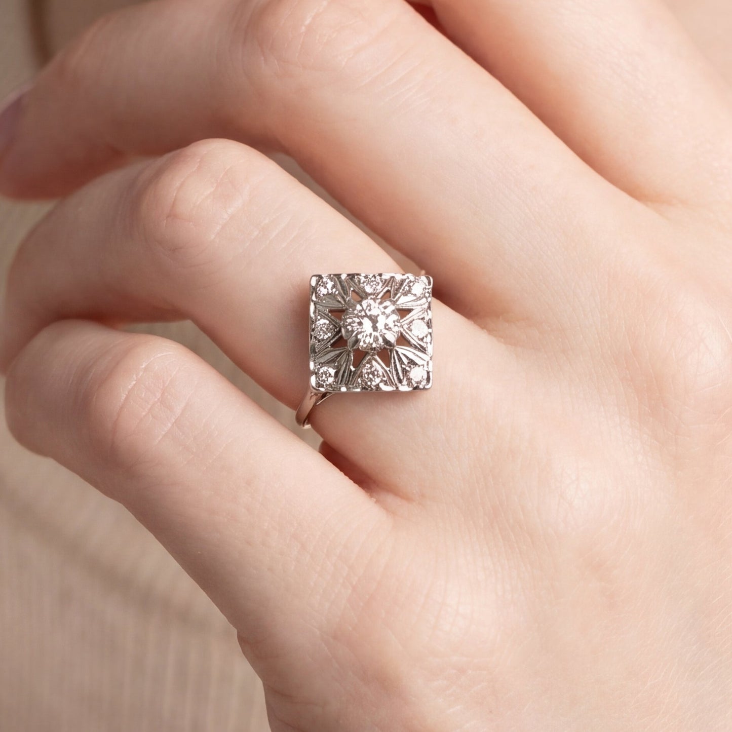 Art Deco diamond filigree cocktail ring in 14k white gold, featuring intricate vintage silver lady design and detailed craftsmanship.