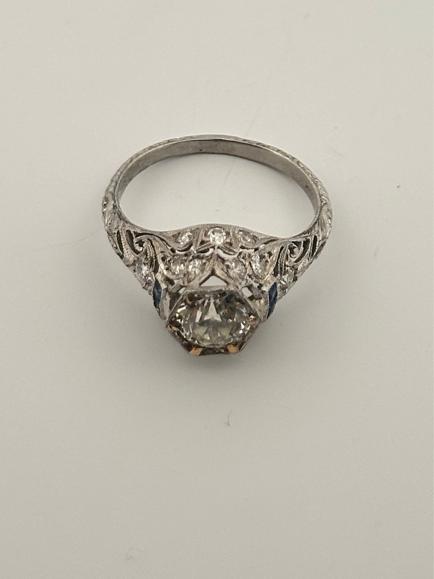 Antique art deco platinum old European cut diamond ring with sapphire accents