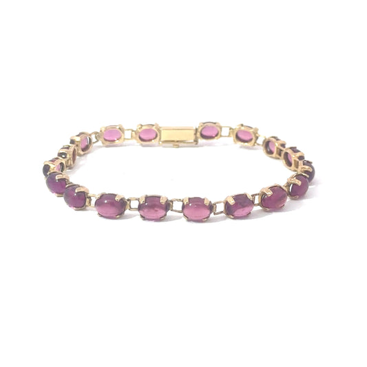 Vintage rhodalite garnet cabochon tennis bracelet in 14k yellow gold