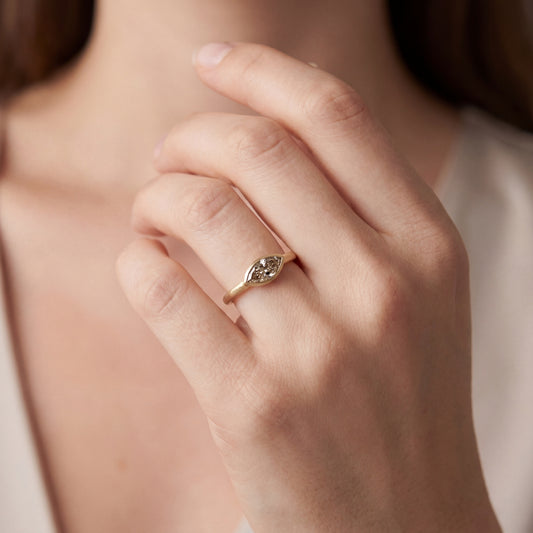 Natural Champagne Marquise diamond ring in an east west bezel setting in 14k yellow gold