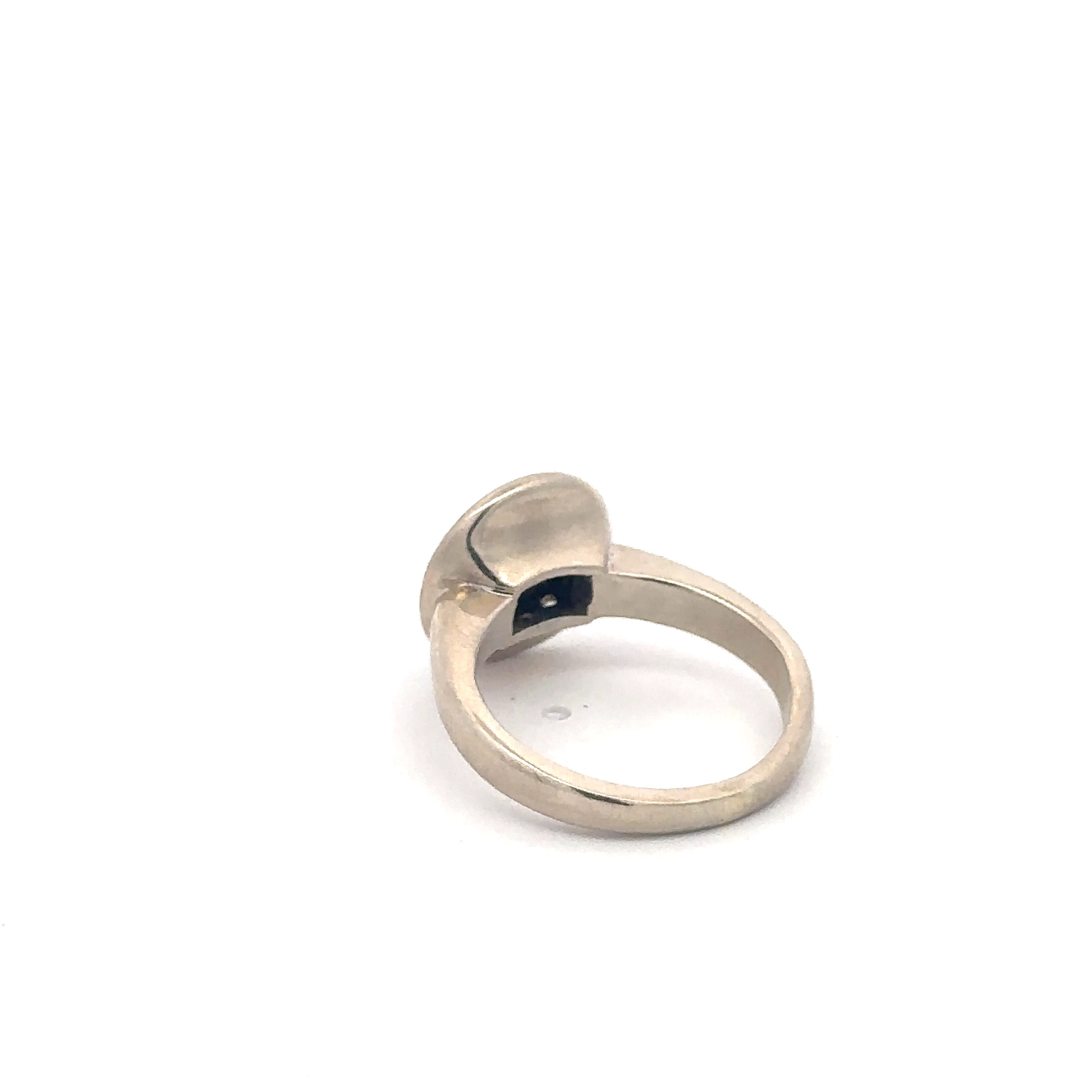 Vintage brilliant cut diamond halo ring in 14k white gold, featuring intricate silver detailing from Silver Lady Vintage.