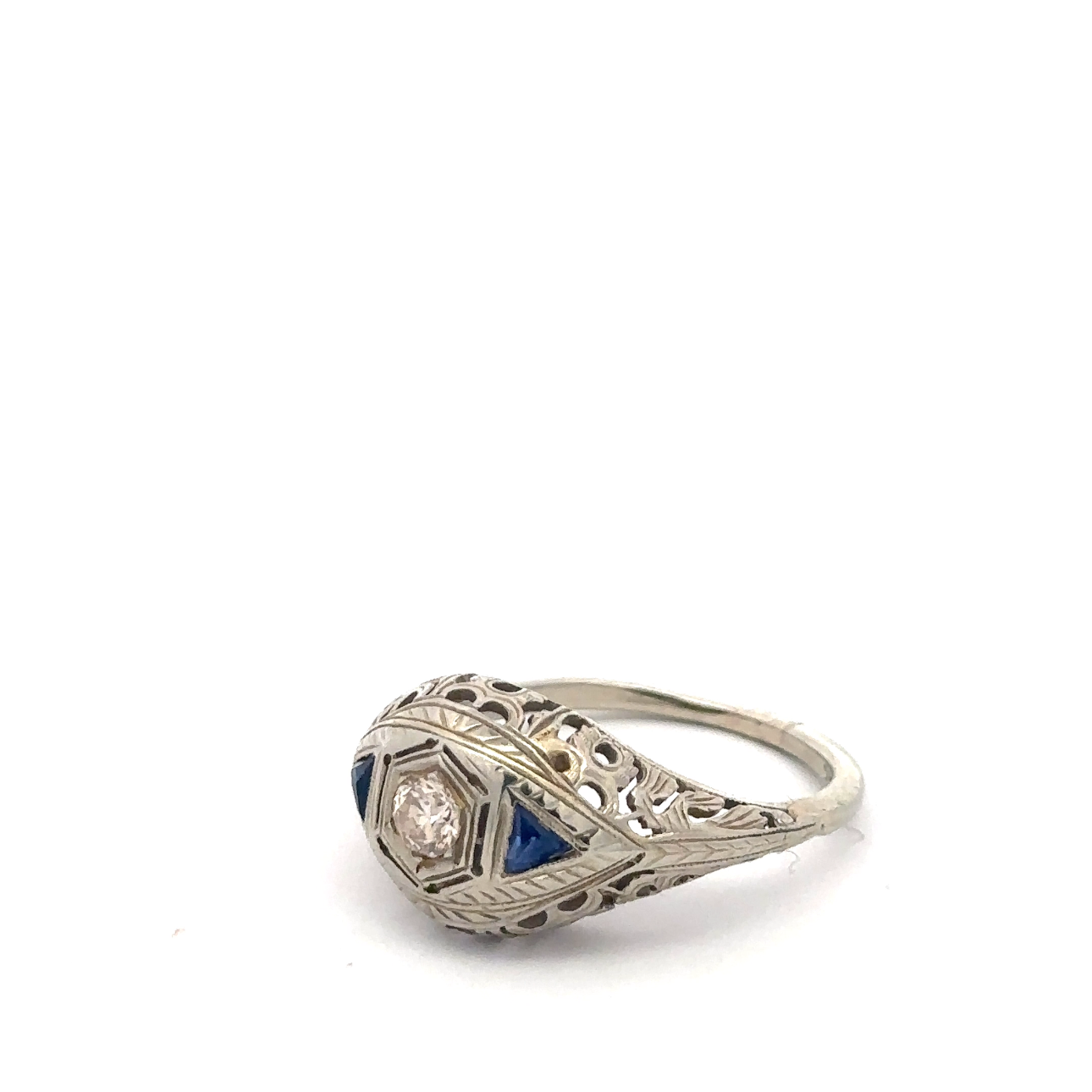 Art deco sapphire and diamond ring in 18k white gold with intricate vintage design, crafted by Silver Lady Vintage.