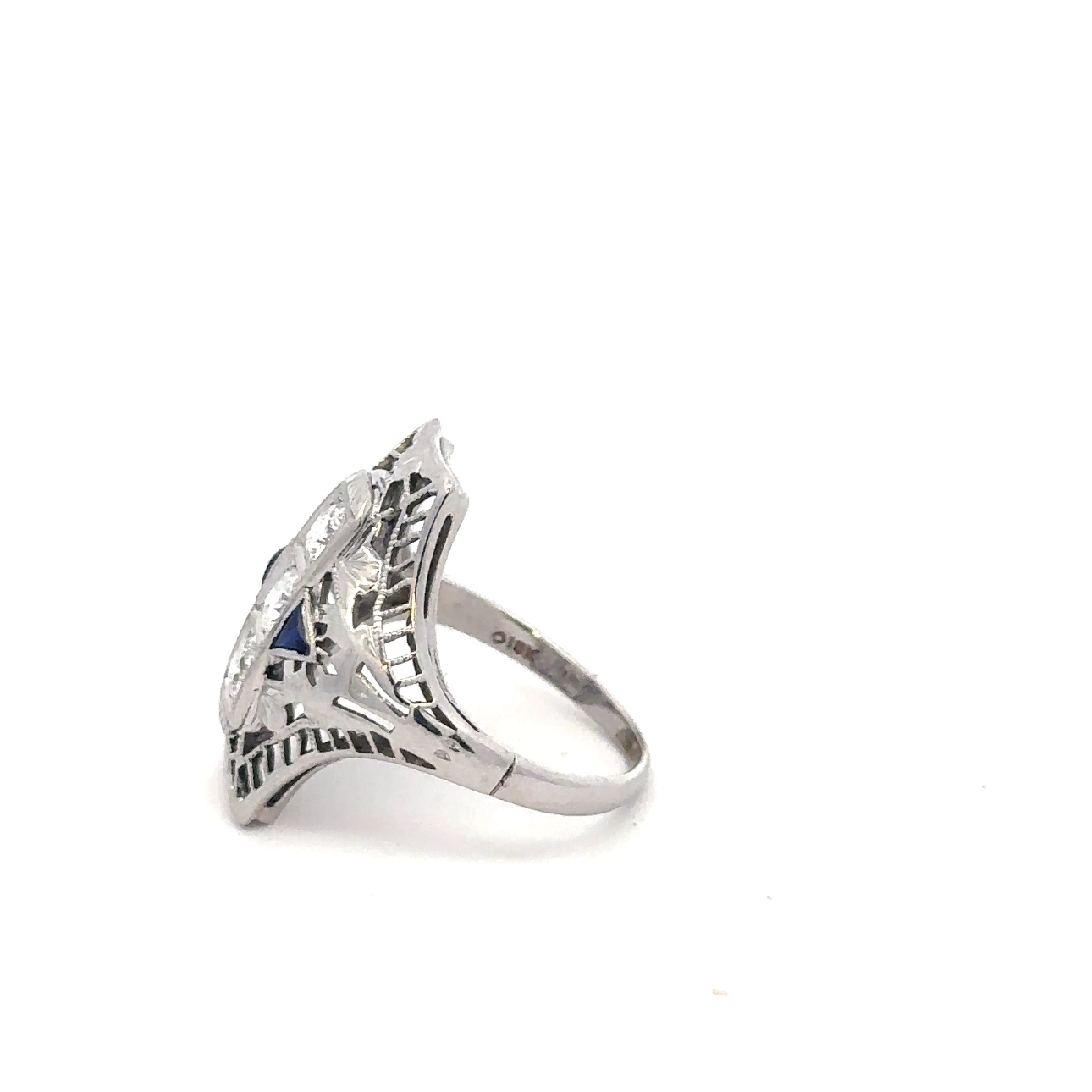 Art deco shield ring by Silver Lady Vintage featuring a sapphire and diamond set in 18k white gold.