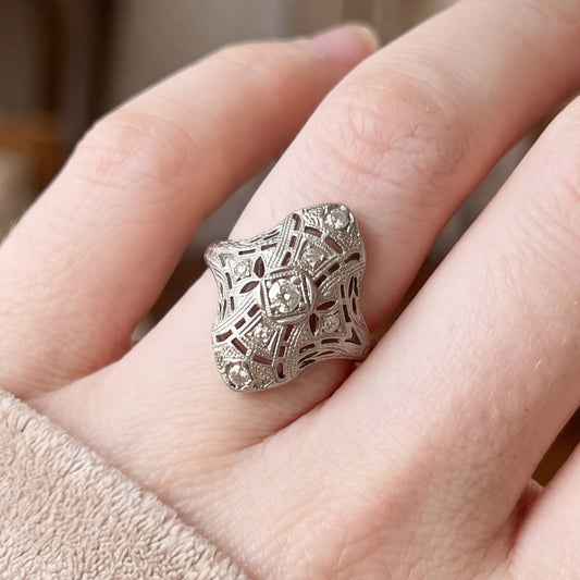 Art deco diamond shield ring in 18k white gold featuring geometric design and sparkling diamonds, from Silver Lady Vintage.