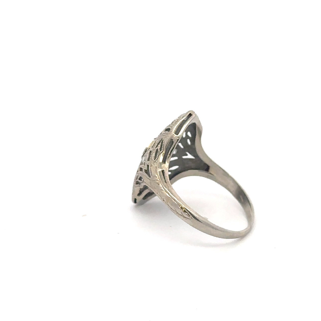 Silver Lady Vintage art deco diamond shield ring crafted in 18k white gold, featuring an intricate vintage design with sparkling diamonds.