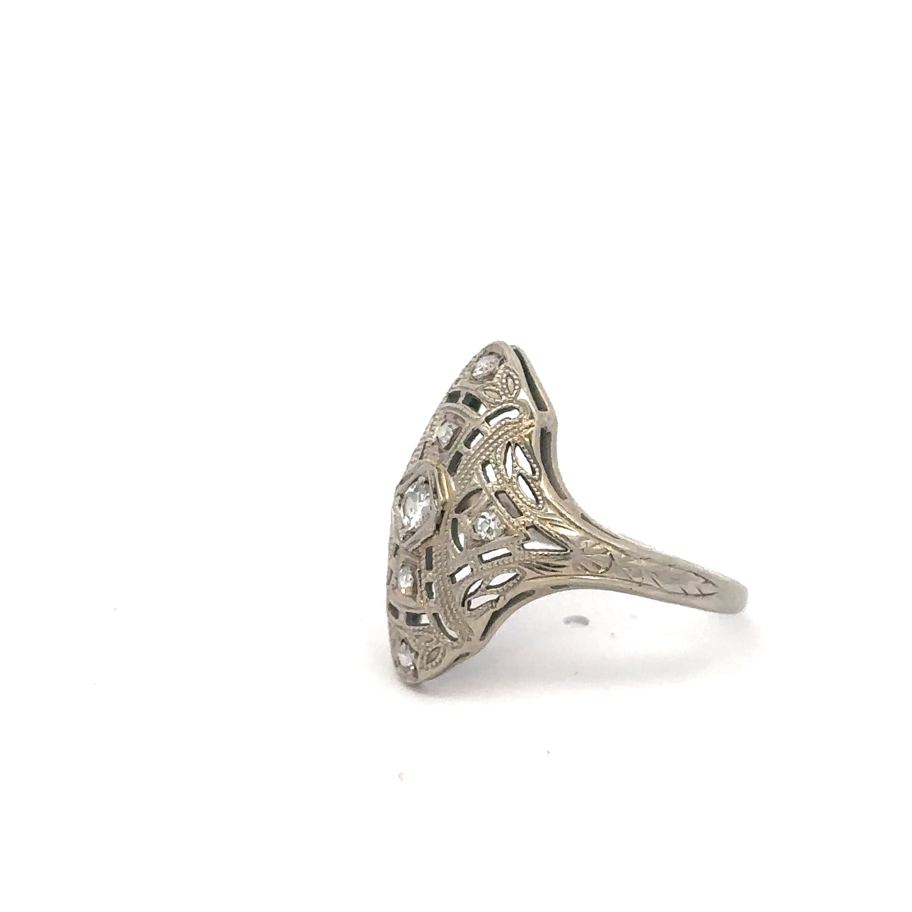 Silver Lady Vintage art deco diamond shield ring crafted in 18k white gold with geometric design and sparkling gemstone accents.