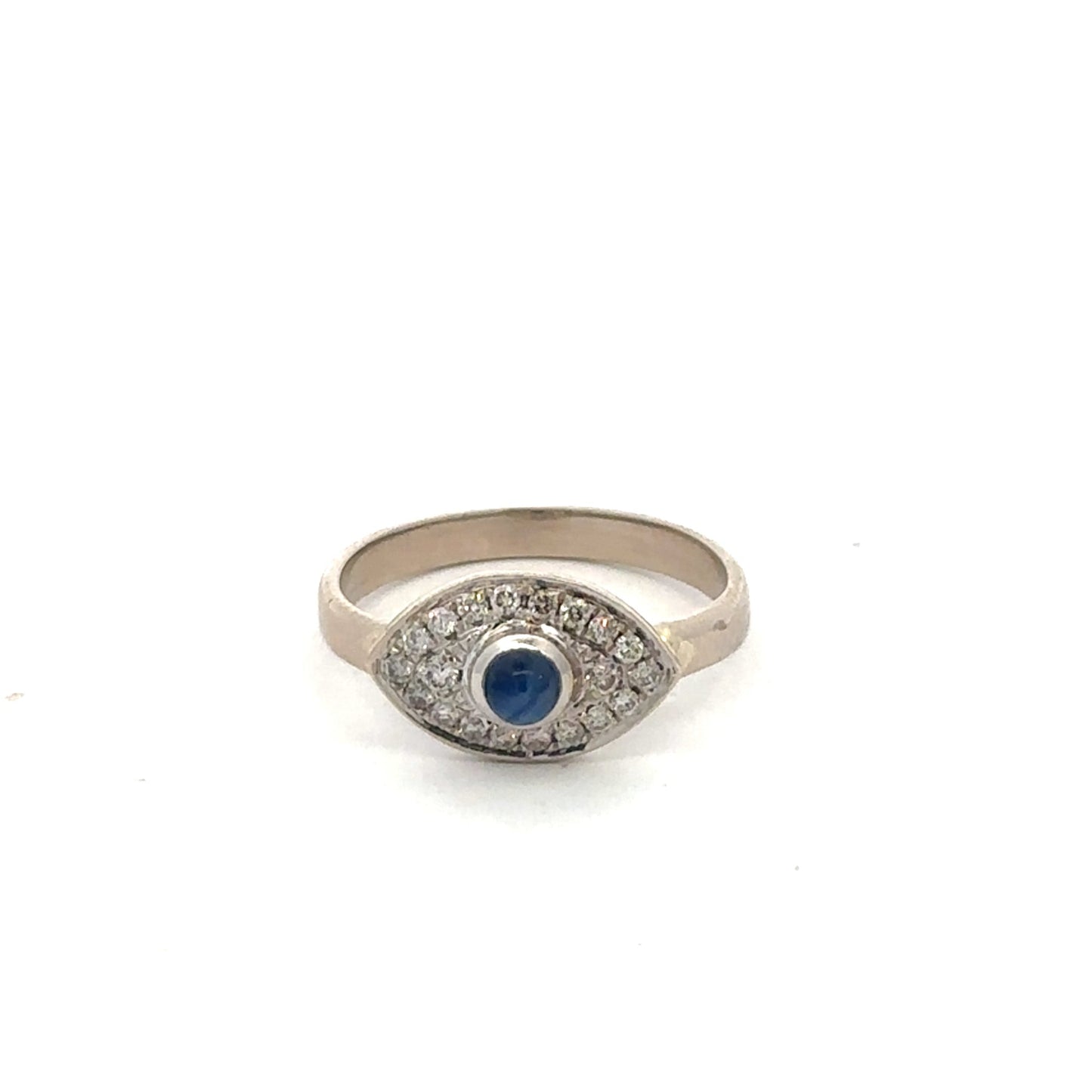 Vintage sapphire cabochon and diamond evil eye ring in 14k white gold, featuring intricate silver Lady Vintage jewelry design.