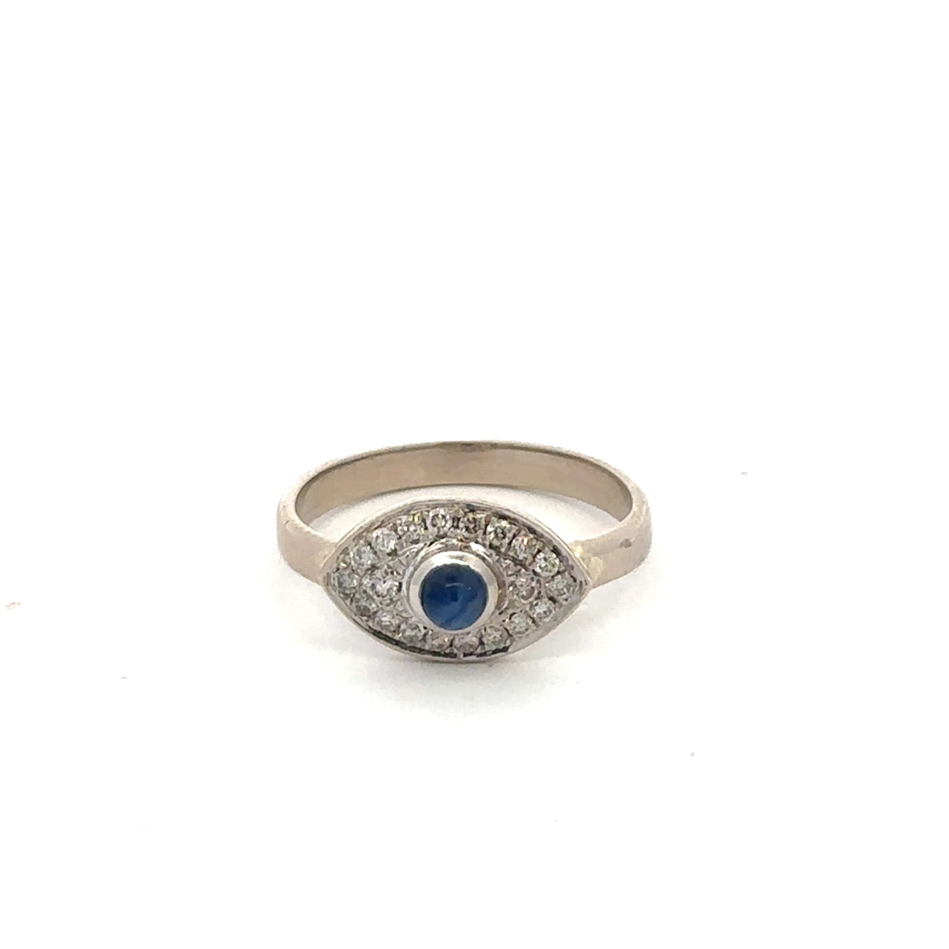 Vintage sapphire cabochon and diamond evil eye ring in 14k white gold, featuring intricate silver Lady Vintage jewelry design.