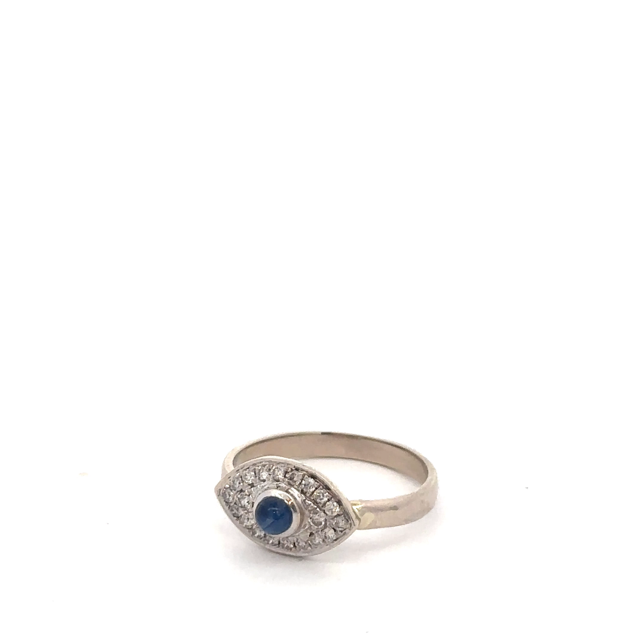 Vintage sapphire and diamond evil eye ring in 14k white gold by Silver Lady Vintage, featuring a cabochon sapphire centerpiece.