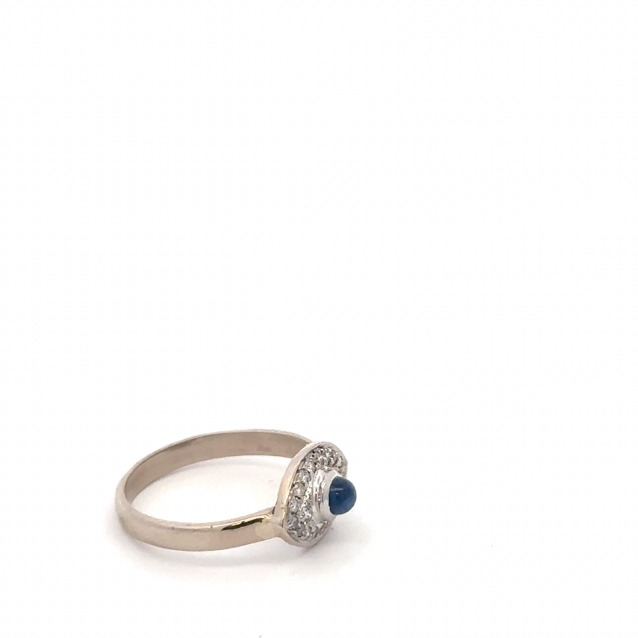 Vintage sapphire cabochon and diamond evil eye ring in 14k white gold, Silver Lady Vintage jewelry with intricate design details.