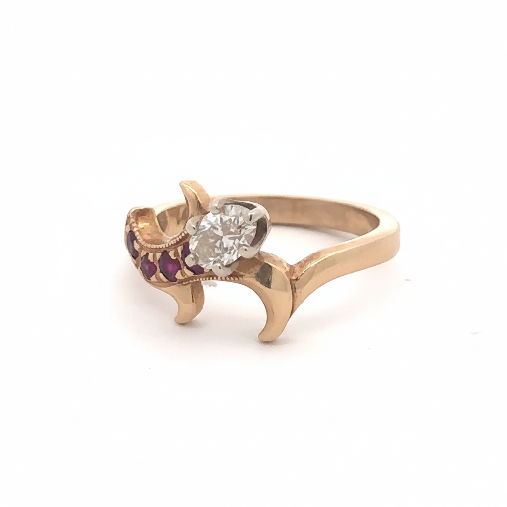 Antique Victorian Moval diamond and ruby ring in 14k yellow gold, featuring intricate vintage design and gemstone accents.