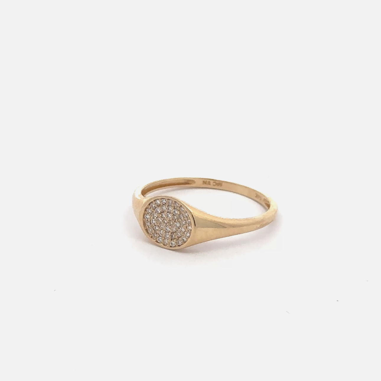 Diamond pavé circular signet ring in yellow gold, showcasing a sparkling diamond-studded band with a smooth, polished finish.