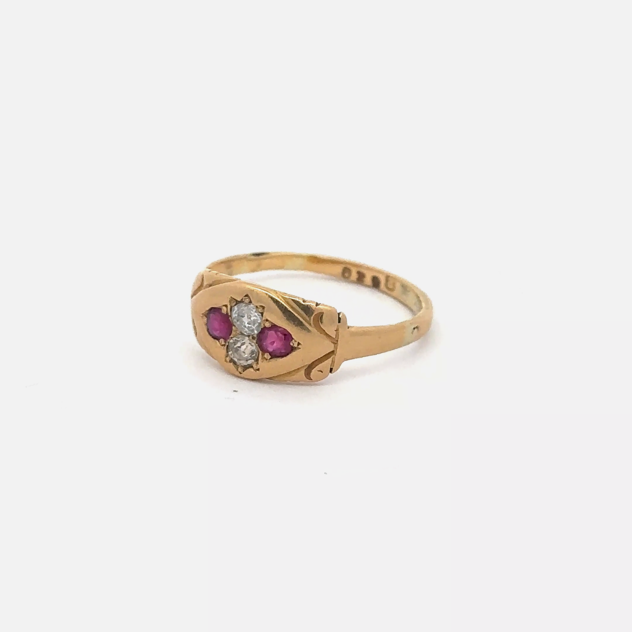 Antique Victorian ruby and old mine cut diamond ring in 9k yellow gold, featuring intricate vintage jewelry design.