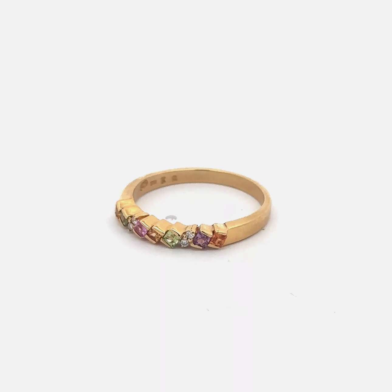 Rainbow sapphire stackable ring in 18k yellow gold with colorful sapphires, from Silver Lady Vintage.