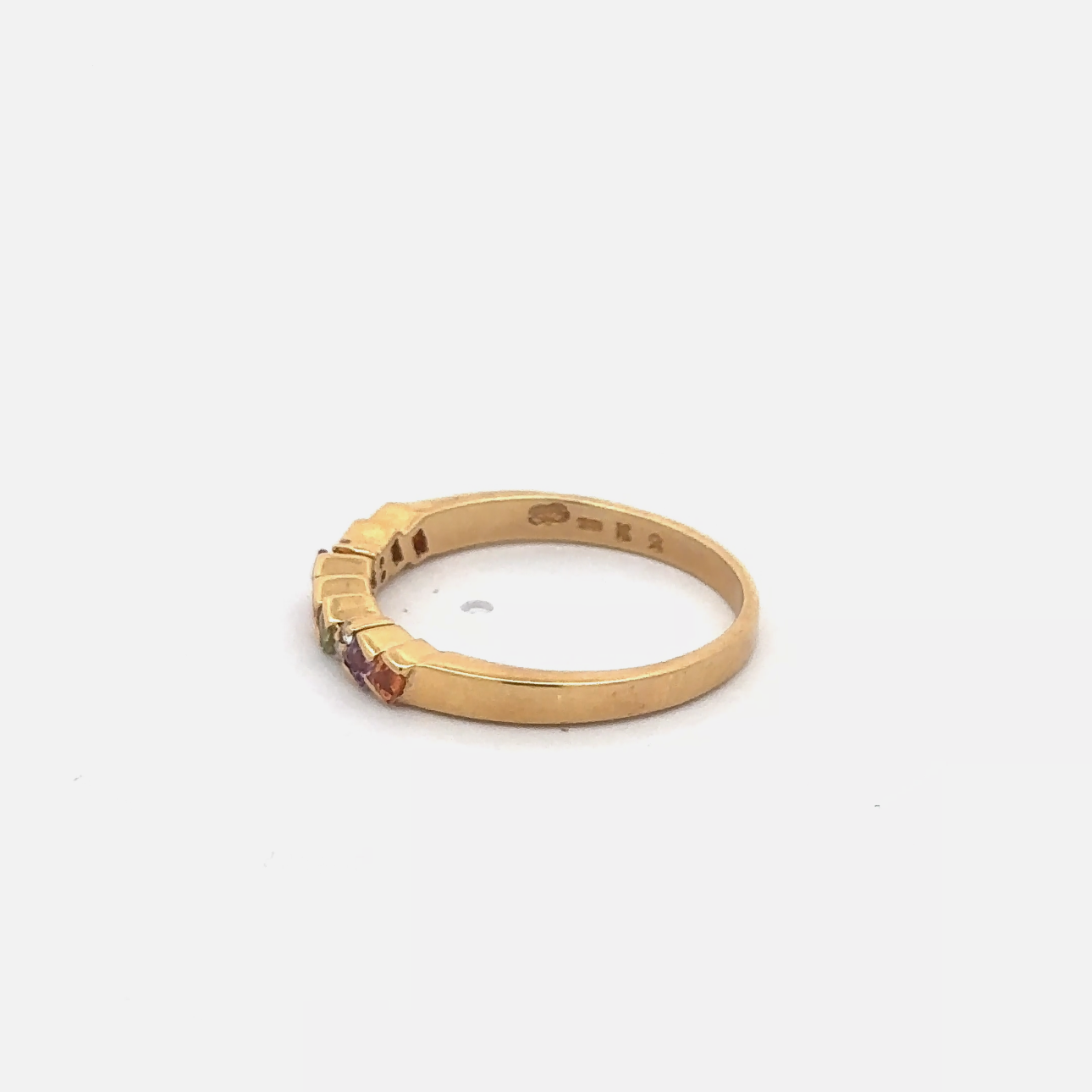 Rainbow sapphire stackable ring in 18k yellow gold featuring vibrant sapphires and elegant design from Silver Lady Vintage.