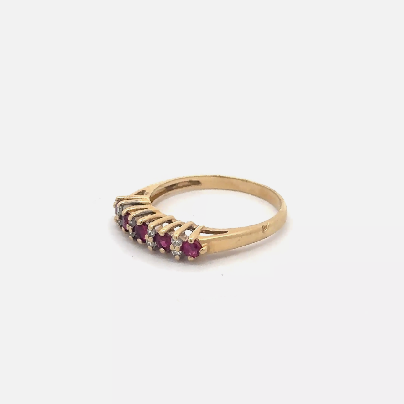 Natural ruby and diamond stacker band in 14k yellow gold, featuring elegant gemstone detailing from Silver Lady Vintage.