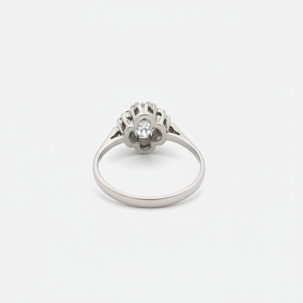 Elegant Art Deco floral motif diamond ring in 18k white gold by Silver Lady Vintage, showcasing intricate vintage jewelry craftsmanship.