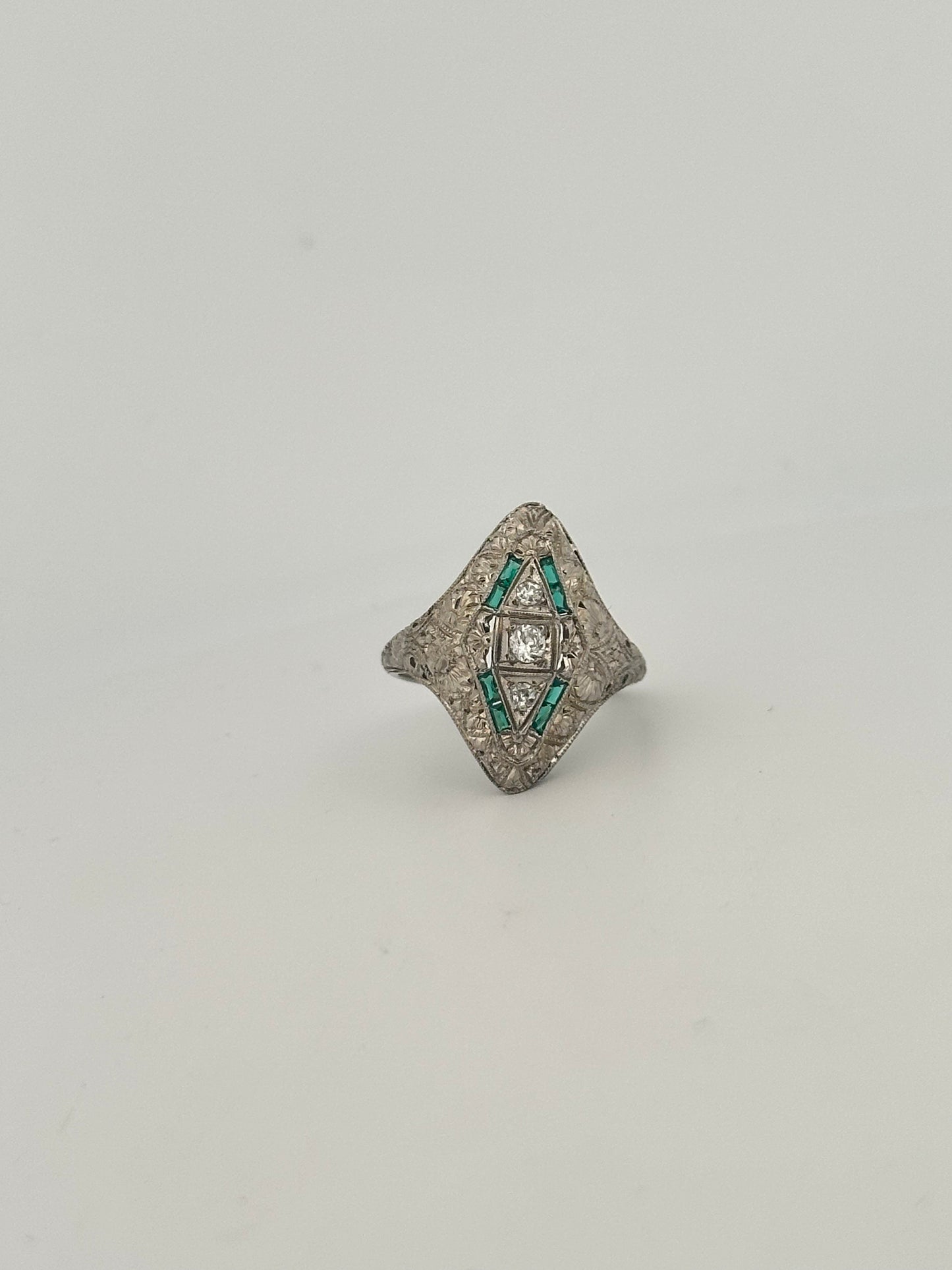 Antique 18k white gold natural diamond and emerald shield ring