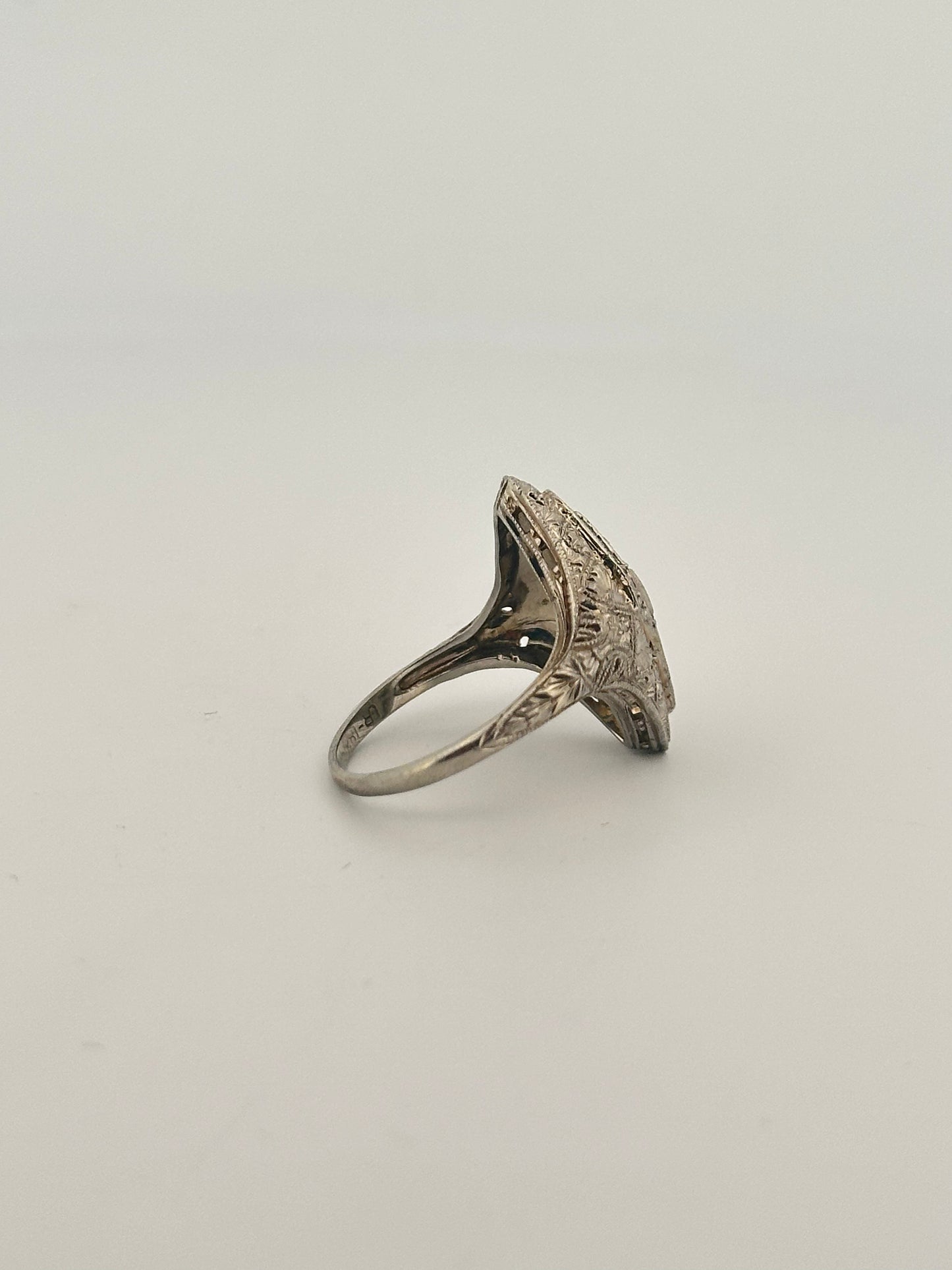 Antique 18k white gold natural diamond and emerald shield ring