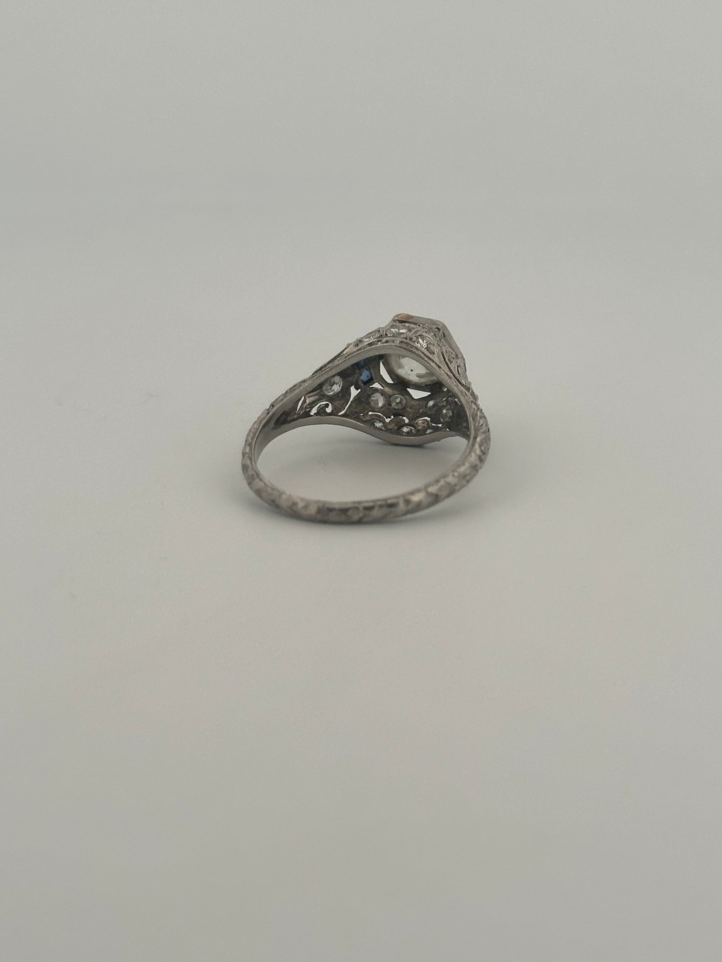 Antique art deco platinum old European cut diamond ring with sapphire accents
