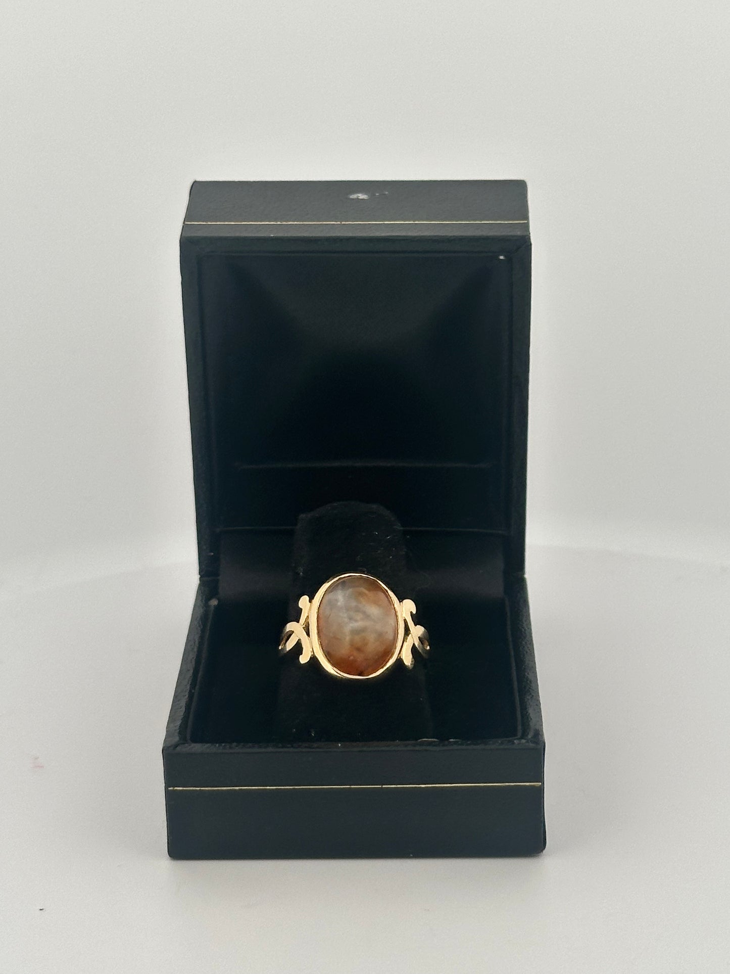 Fire agate cabochon ring in 10k yellow gold